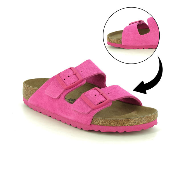 Birkenstock Arizona women's fuchsia suede slide sandals featuring two adjustable buckles and a shaped cork footbed
