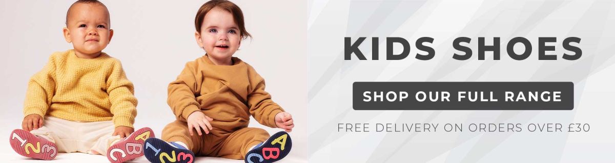 Shop our range of Kids Shoes and get free UK delivery on orders over £30 [and infant boy and girl sit side by side wearing Clarks shoes]