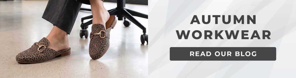 Leopard print backless loafers with gold horsebit details worn with grey trousers alongside text reading "Autumn Workwear: Read Our Blog".